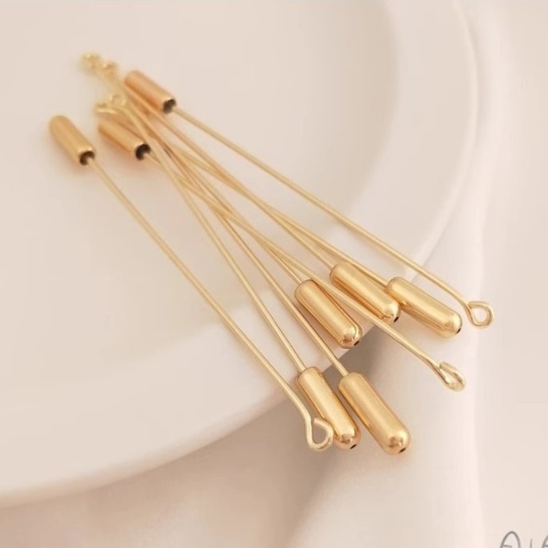 9-Zeichen-Brosche, lange Anste – Brooch Pin Gold Bewertung und Preis